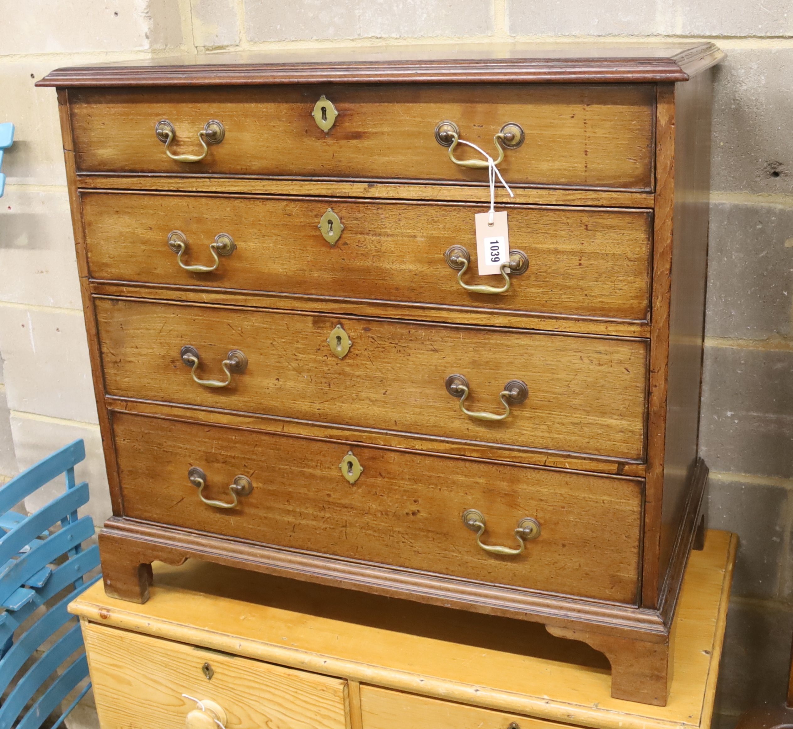 A small George III mahogany chest of four long drawers, width 82cm, depth 47cm, height 78cm